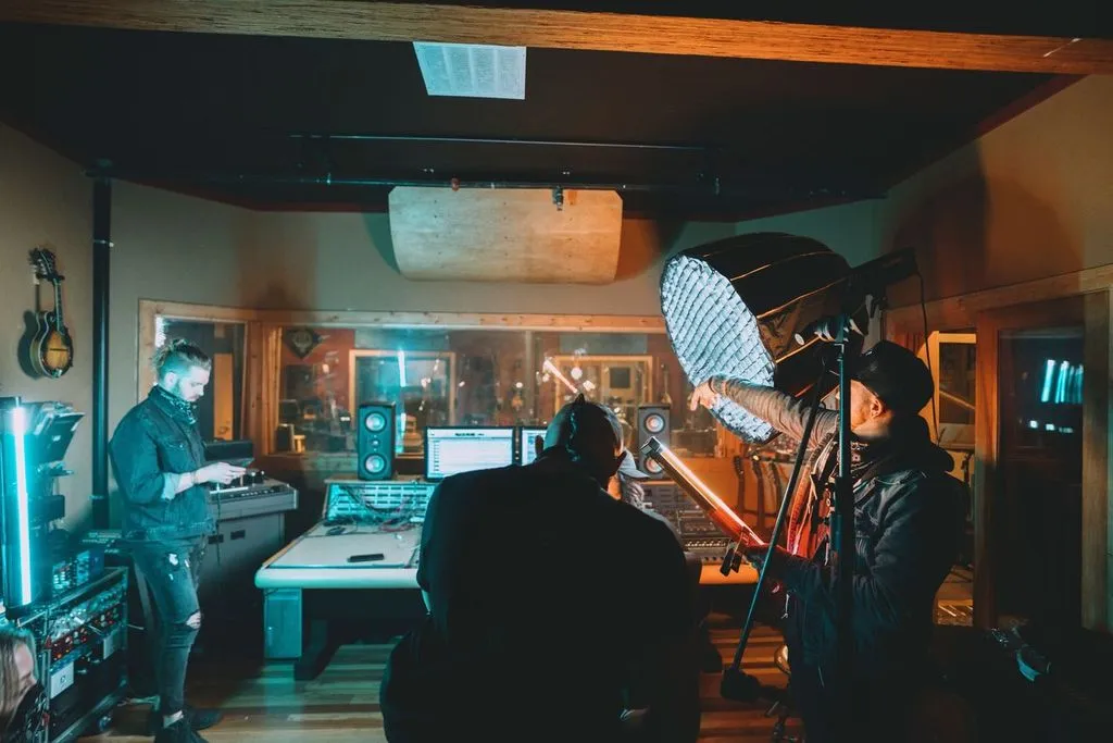 Musicians recording in a studio for Adorama's The Journey