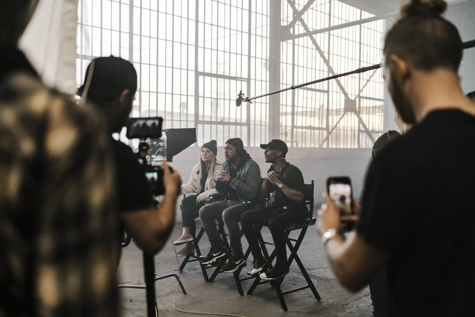 Crew filming an interview in a warehouse for Sony's Flow State