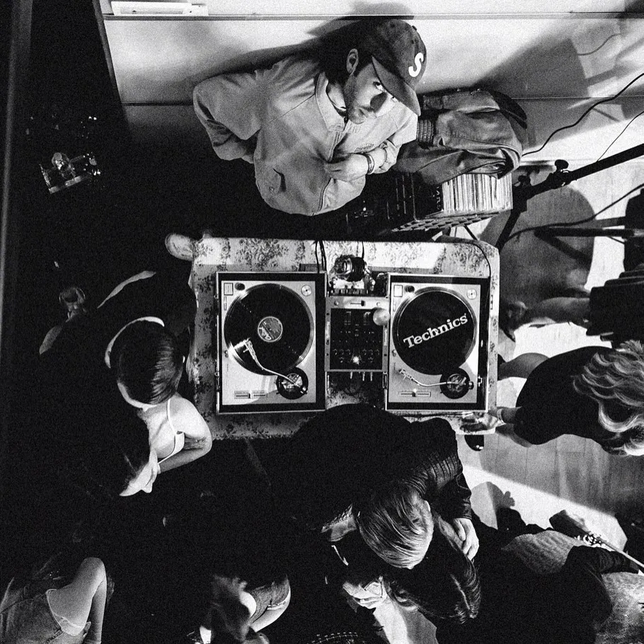 A performer at the decks at Winston House, seen from above